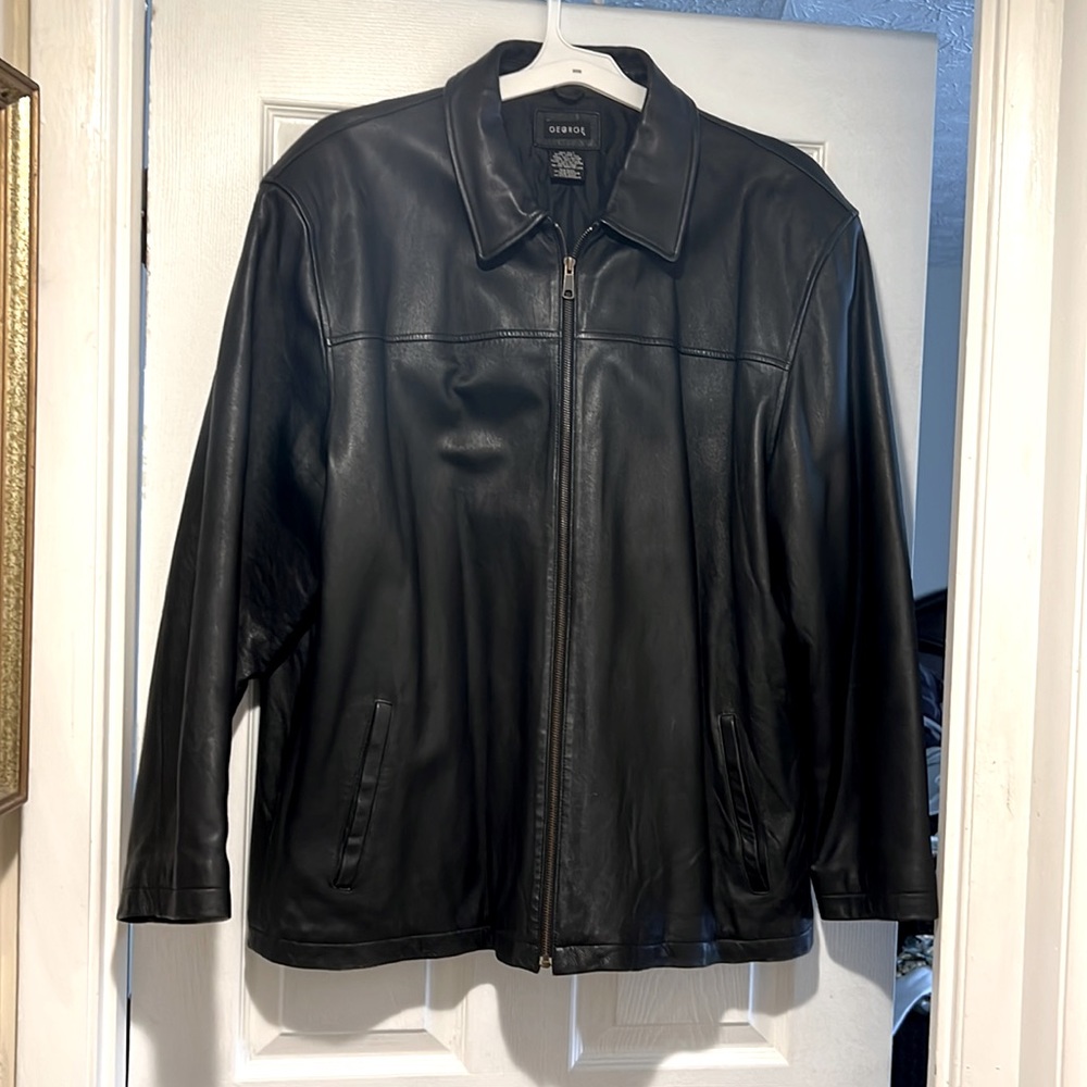 Black leather jacket gently used no holes a few light scratches